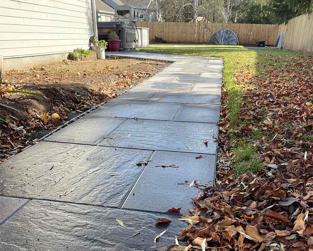 polished stone paved pathway bend or